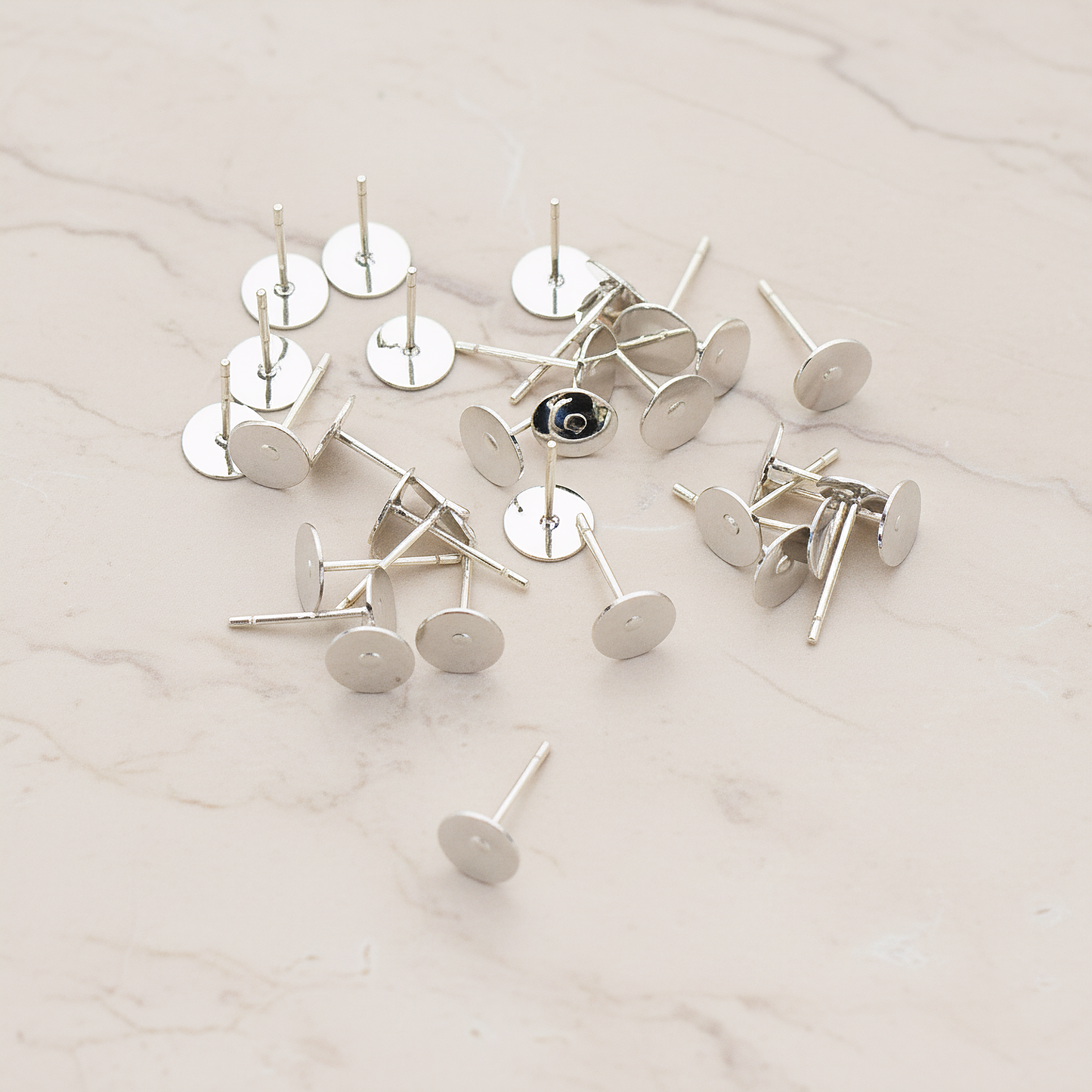 Round Pad with Titanium Ear Post, 12 Pc - 6mm (ER.872)