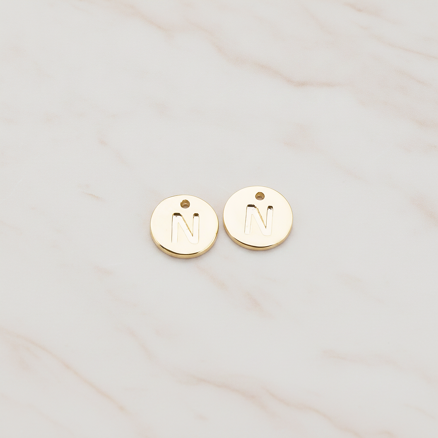 Round Disk Initial Pendant, 2 Pc on warm marble background (PD.219)