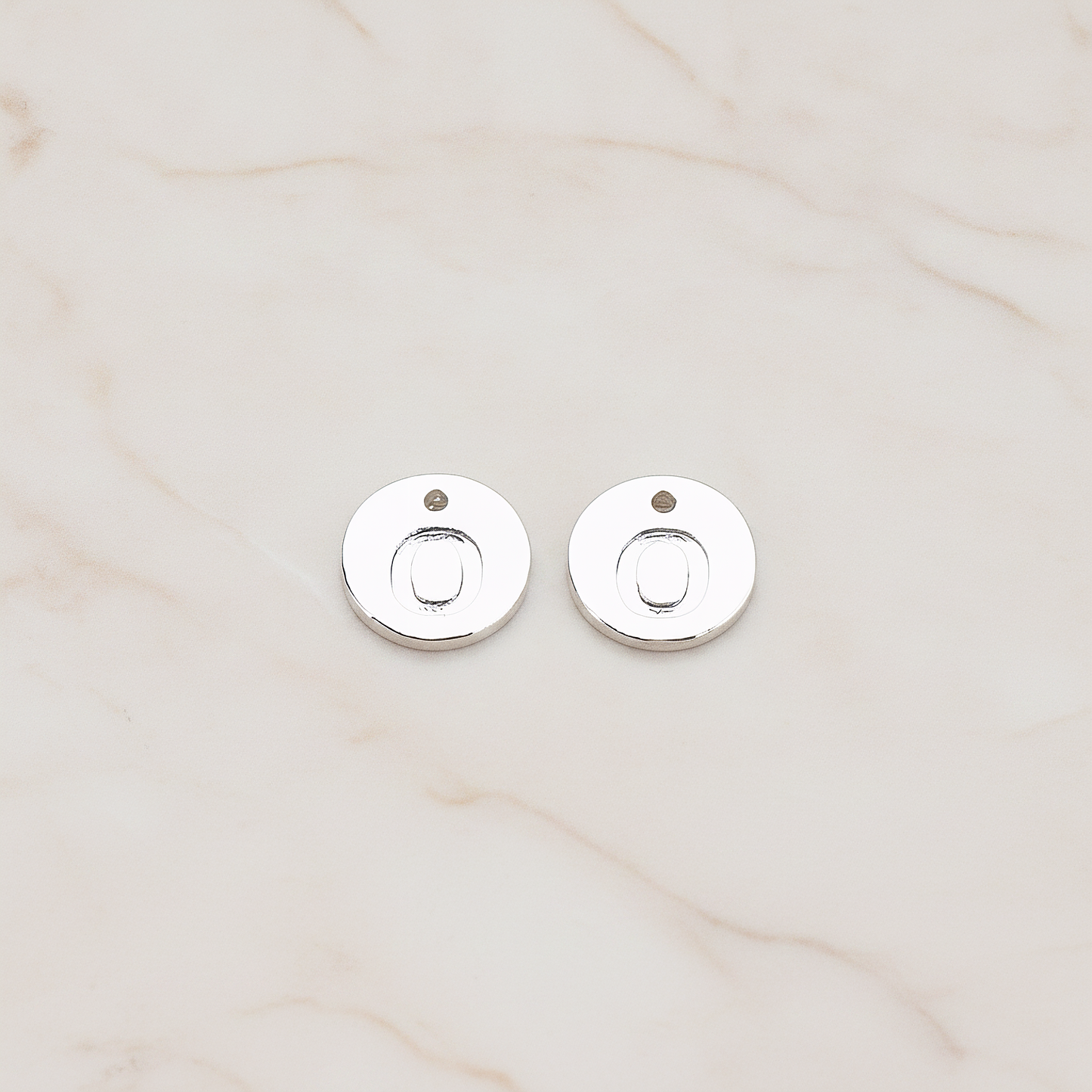 Round Disk Initial Pendant, 2 Pc on warm marble background (PD.219)