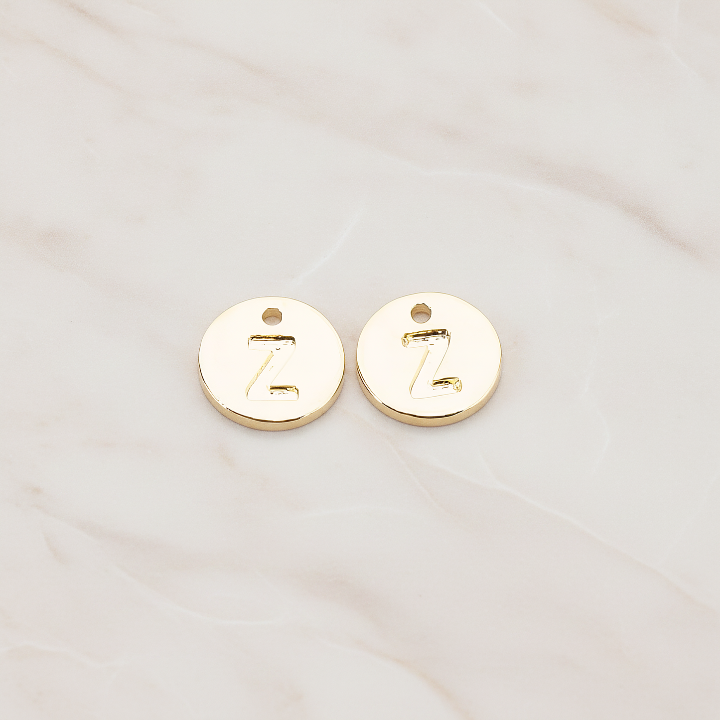 Round Disk Initial Pendant, 2 Pc on warm marble background (PD.219)