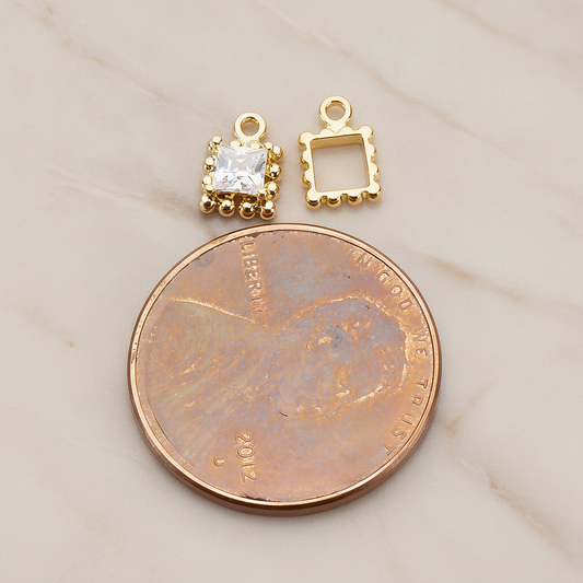 Square Framed Cubic Setting Pendant, 2 Pc on warm marble background (PD.1078)