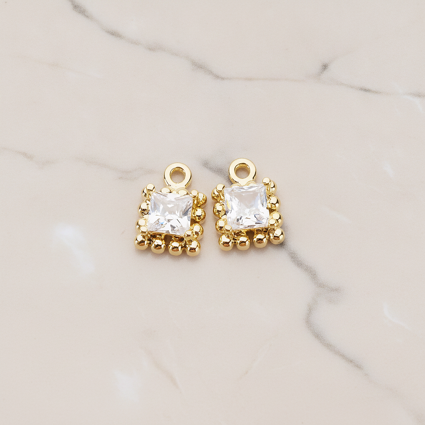Square Framed Cubic Setting Pendant, 2 Pc on warm marble background (PD.1078)