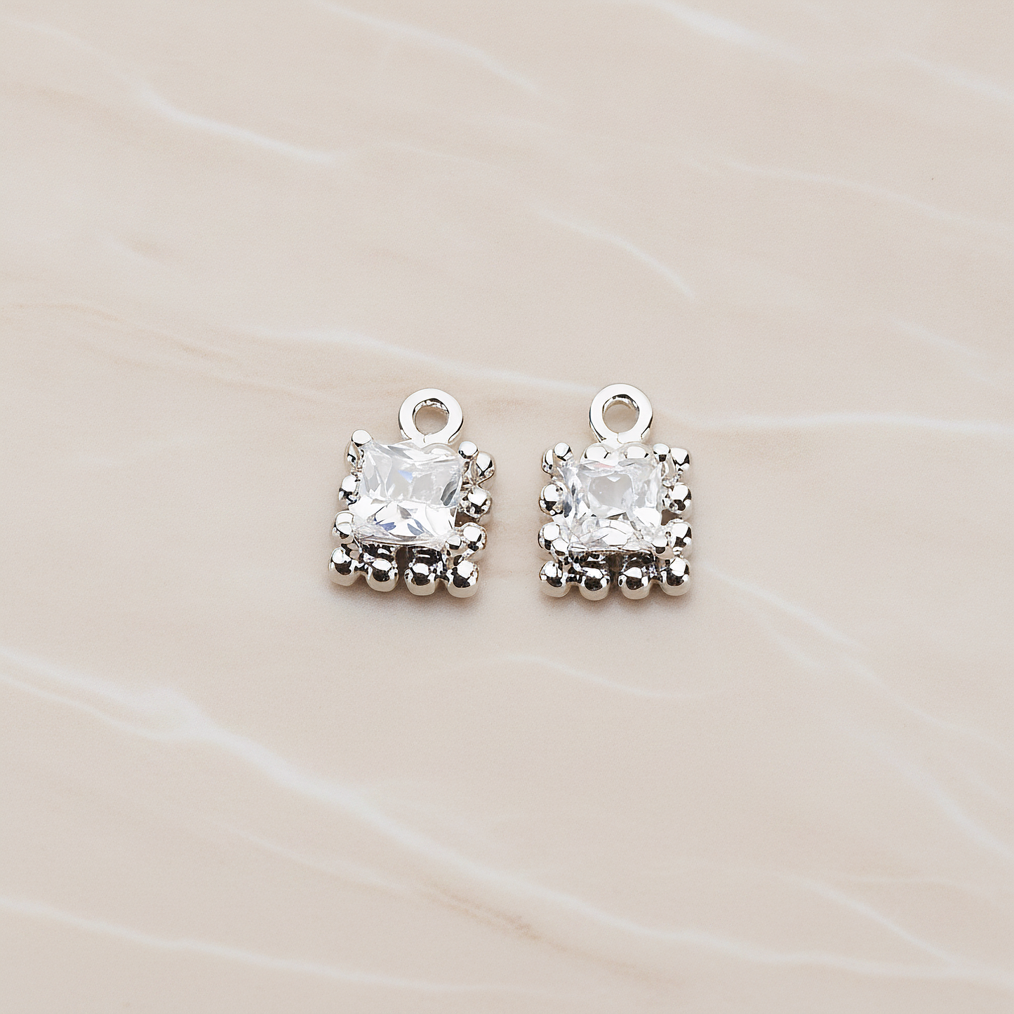 Square Framed Cubic Setting Pendant, 2 Pc on warm marble background (PD.1078)