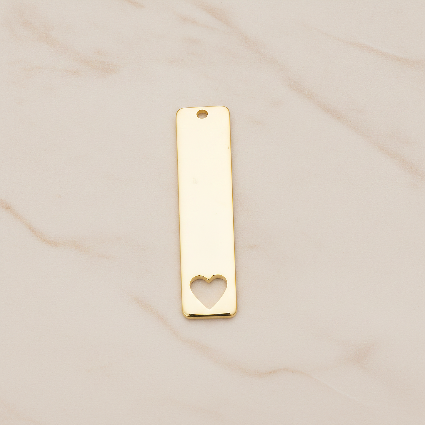 Vertical Heart Silhouette Bar Pendant, 2 Pc on warm marble background (PD.1150)