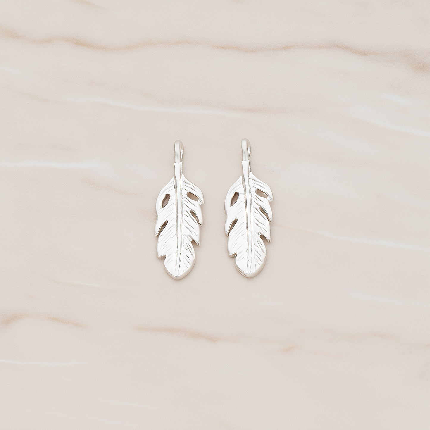 Mini Feather Pendant, 2 Pc on warm marble background (PD.1173)