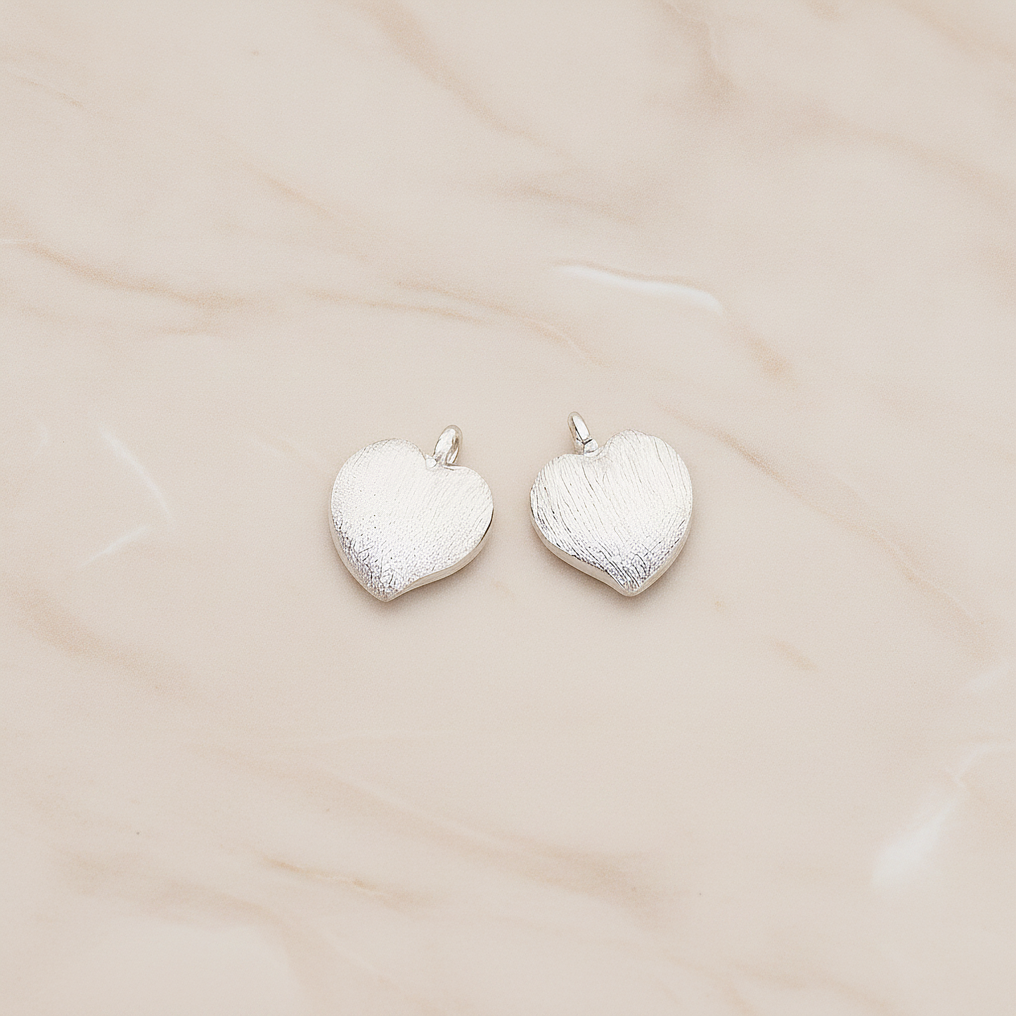 Brushed Cute Apple Shaped Heart Pendant, 2Pc on warm marble background (PD.1296)