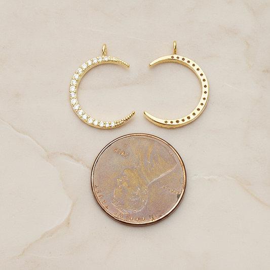 Cubic Zirconia Setting Thin Crescent Moon Pendant, 1 Pc on warm marble background (PD.1365)