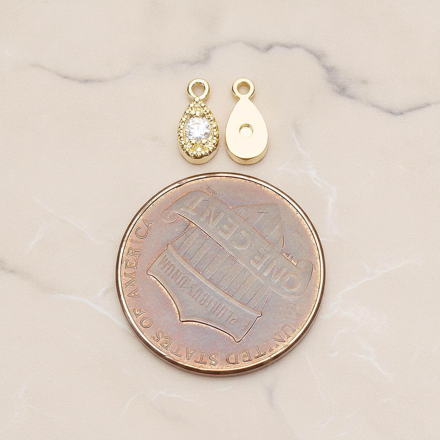Oval Cubic Setting Textured Frame Mini Teardrop Pendant, 2 Pc on warm marble background (PD.1389)