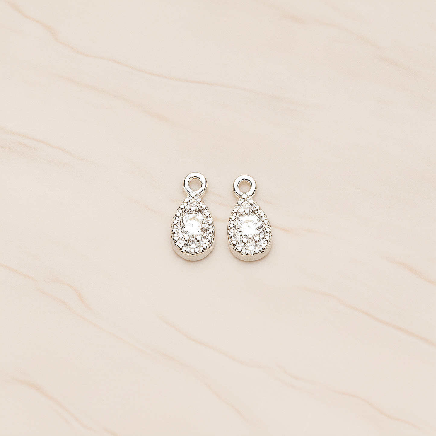 Oval Cubic Setting Textured Frame Mini Teardrop Pendant, 2 Pc on warm marble background (PD.1389)