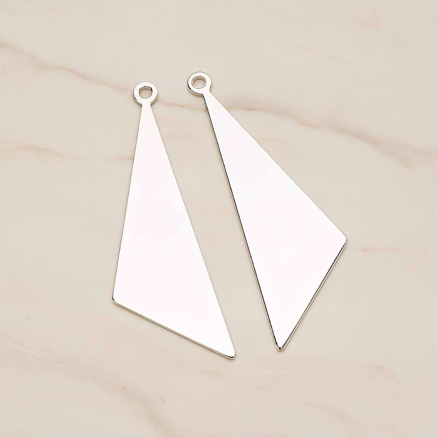 Simple Flat Metal Pad Triangle Pendant, 2 Pc on warm marble background (PD.1419)