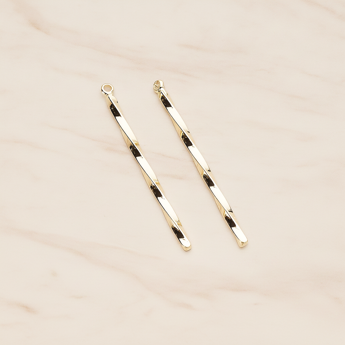 42mm Simple Twisted Vertical Bar Pendant, 2 Pc on warm marble background (PD.1433-01)