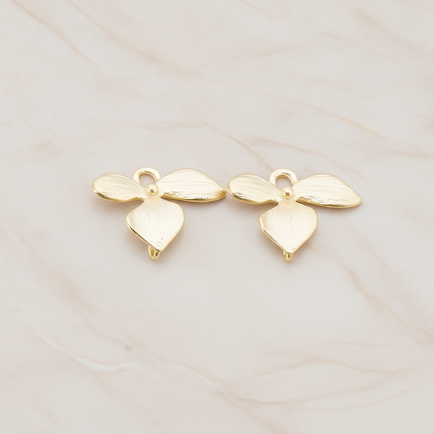 XSMALL Piece Quadruple Flower Pendant, 2 Pc on warm marble background (PD.148-04)