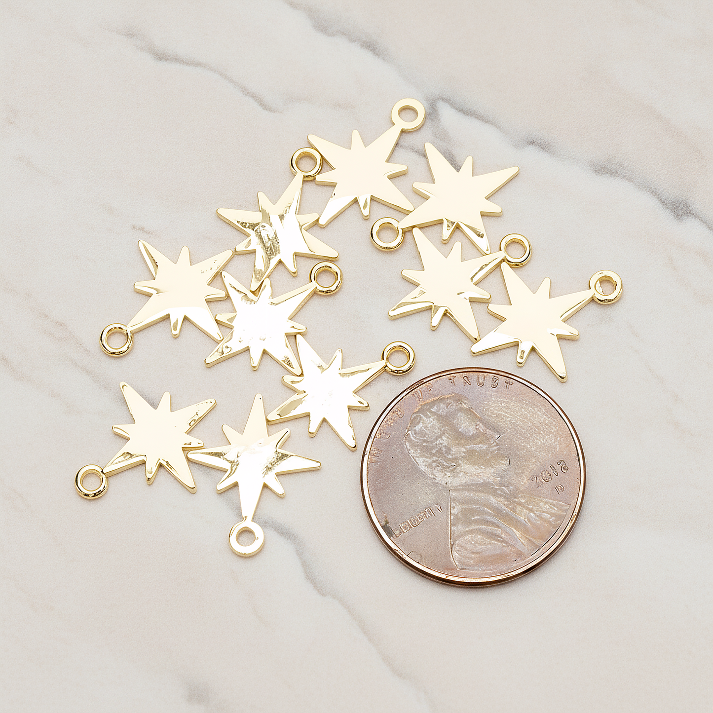 Simple Bright Shinny Star Charm Pendant, 2 Pc on warm marble background (PD.1480)