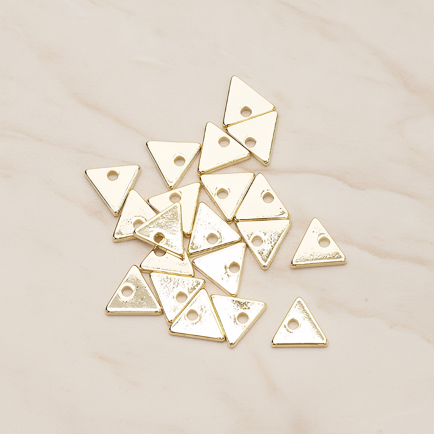 Simple Geometric 7 Mm Triangle Charm Pendant, 4 Pc on warm marble background (PD.1485)