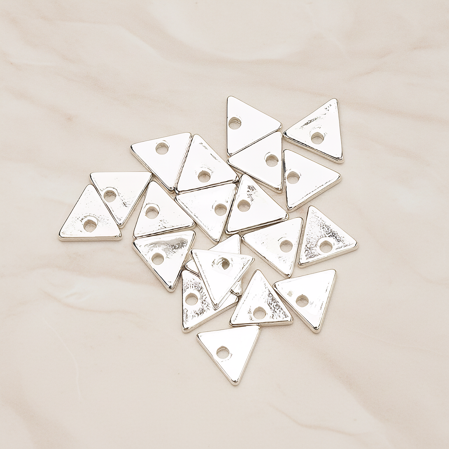 Simple Geometric 7 Mm Triangle Charm Pendant, 4 Pc on warm marble background (PD.1485)