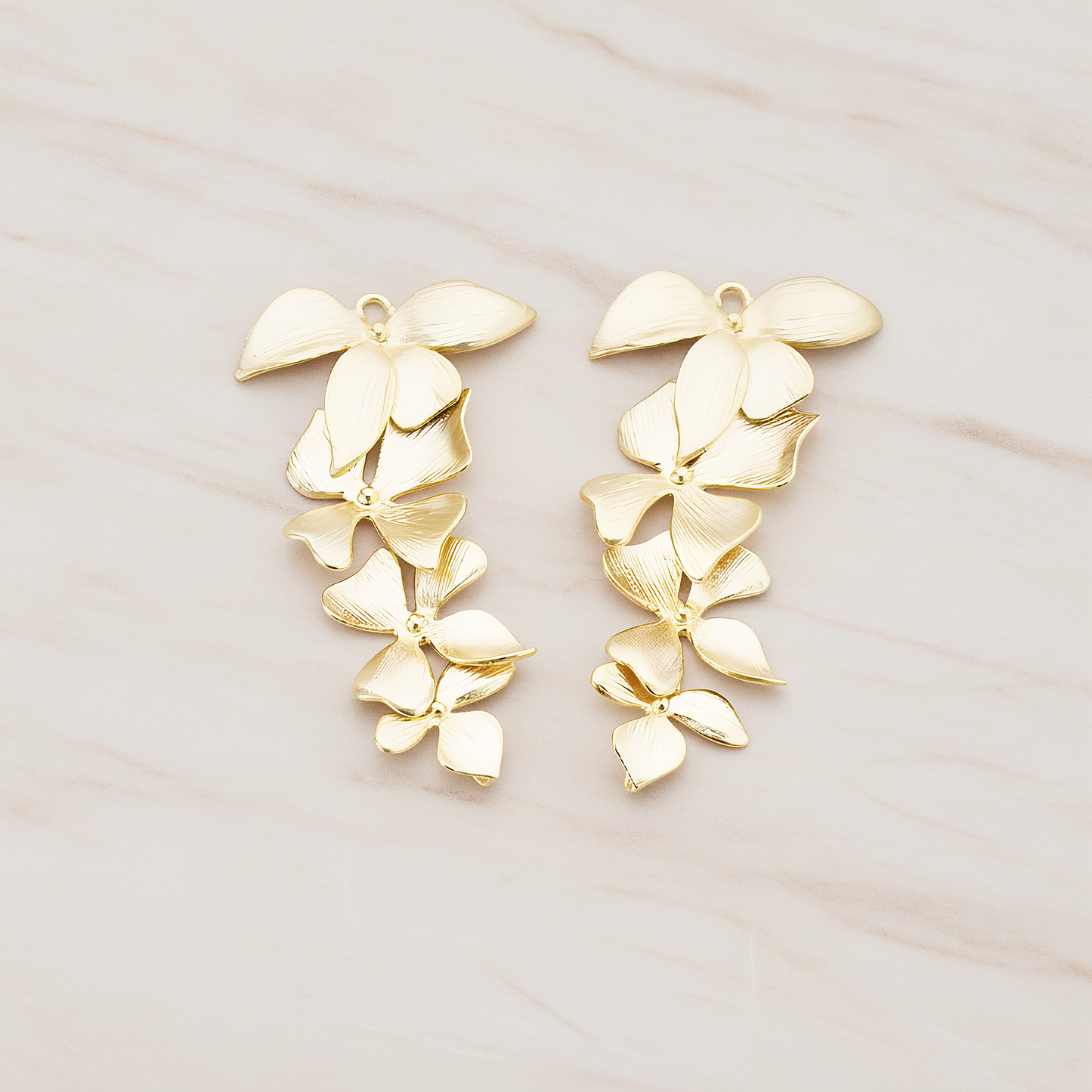 Quadruple Flower Pendant, 2 Pc on warm marble background (PD.148)