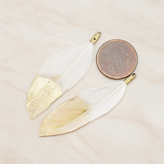 Artificiality Feather Half Dipped in Gold Pendant, 2 Pc on warm marble background (PD.1492-01)