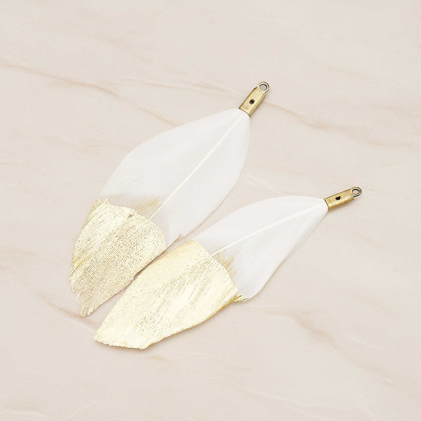 Artificiality Feather Half Dipped in Gold Pendant, 2 Pc on warm marble background (PD.1492-01)