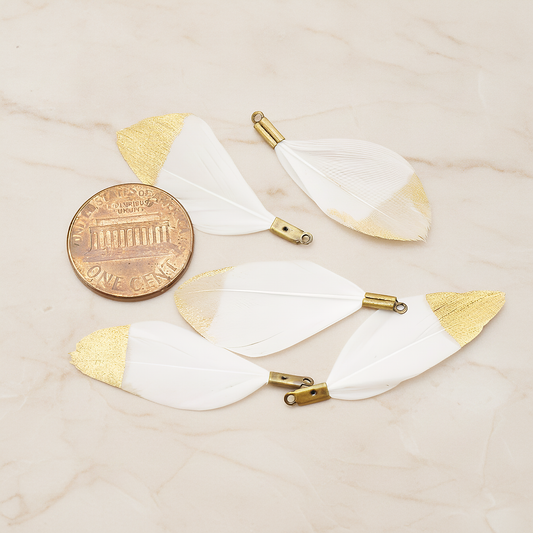 Small Artificiality Feather Half Dipped in Gold Colored Pendant, 2 Pc on warm marble background (PD.1492-05)