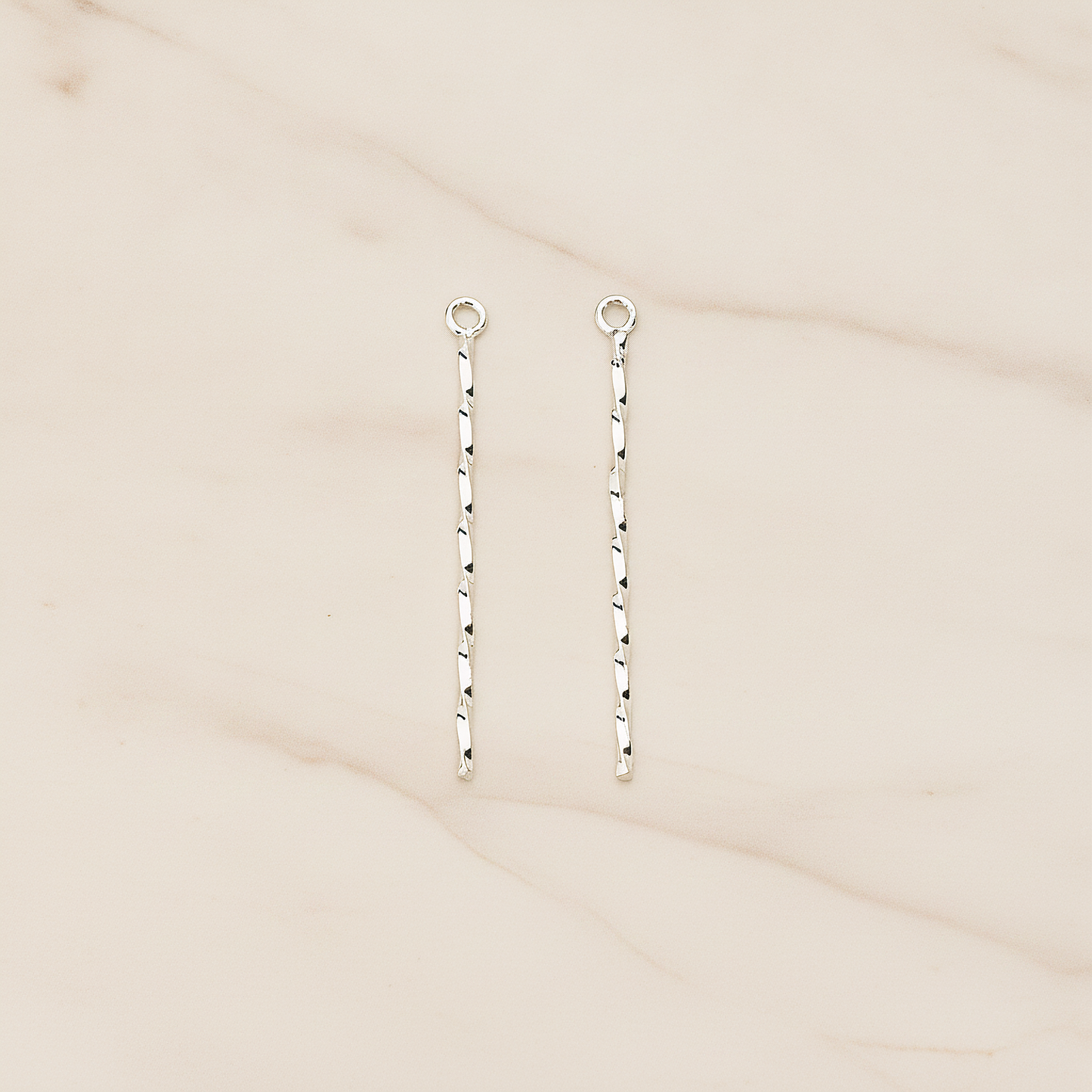 Thin Twisted Bar Charm 32mm Pendant, 2 Pc on warm marble background (PD.1571-01)