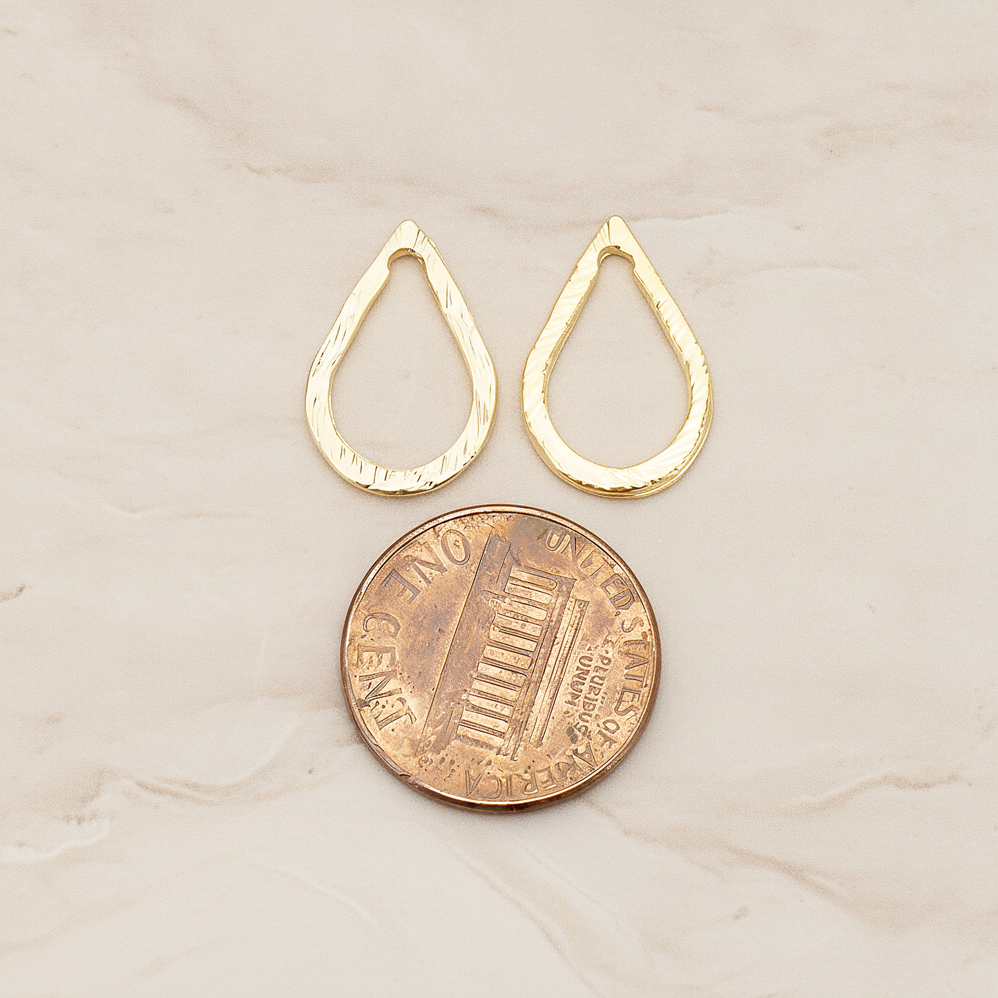 Slash Textured Teardrop Small Link Pendant, 2 Pc on warm marble background (PD.1624-01)