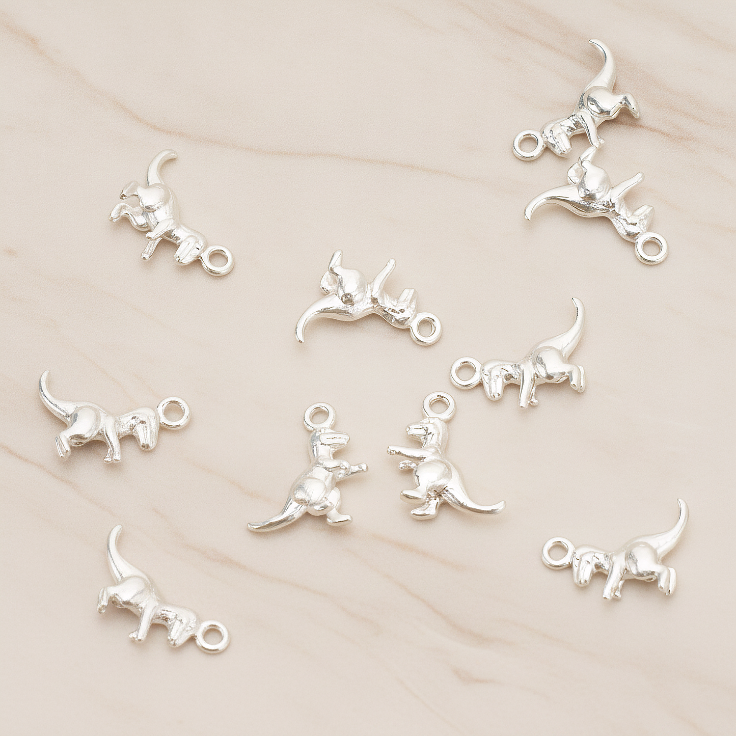 Small Dinosour Pendant, 2 Pc on warm marble background (PD.1694)