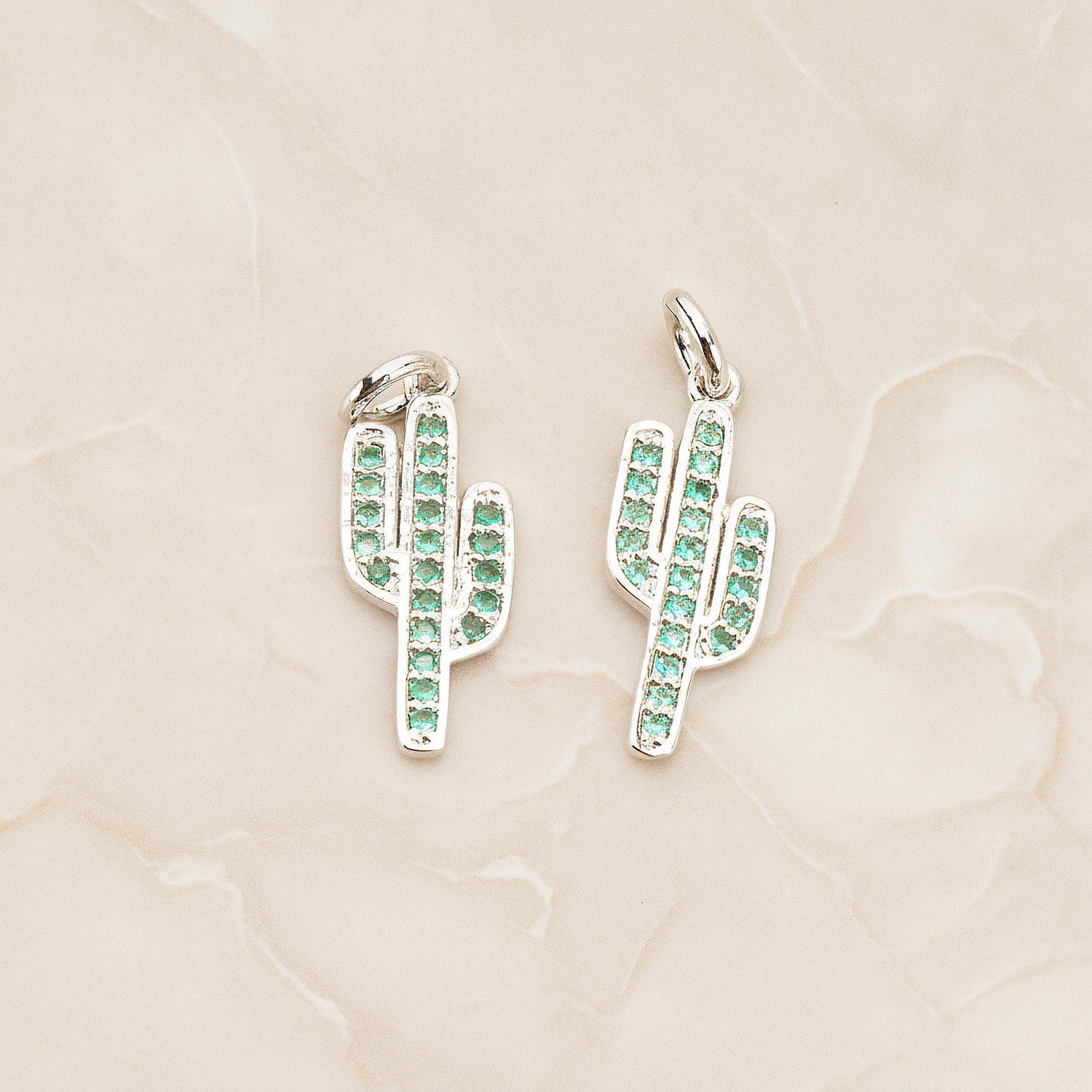 Green Cubic Zirconia Setting Cactus Pendant, 1 Pc on warm marble background (PD.1700)