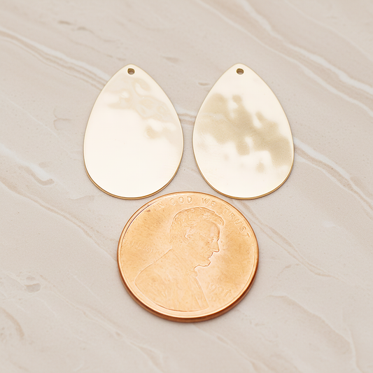 Large Teardrop Stamped Hammered Pendant, 2 Pc on warm marble background (PD.1826-02)