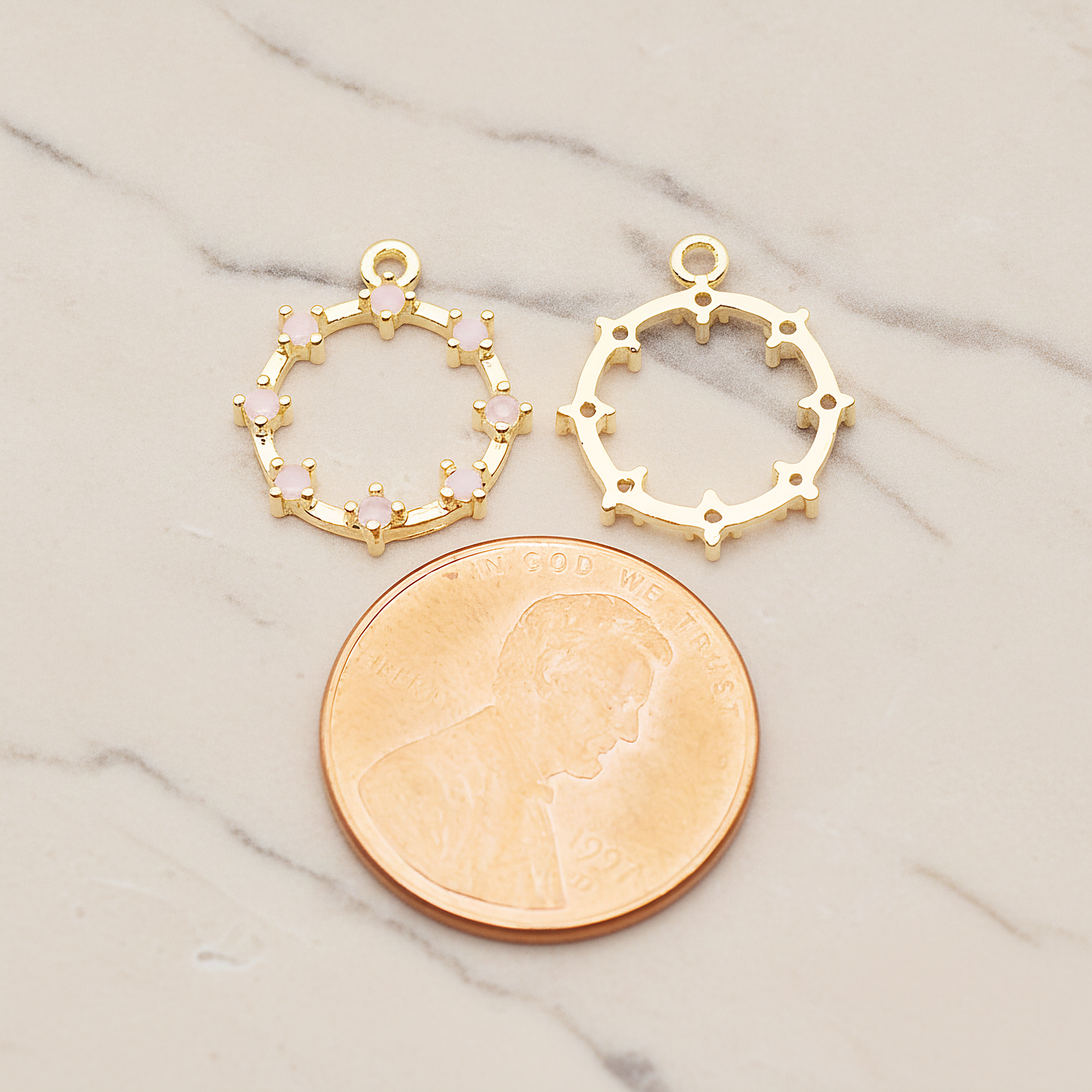 Crown of Beauty Round Cubic Pendant, 2 Pc on warm marble background (PD.1840)