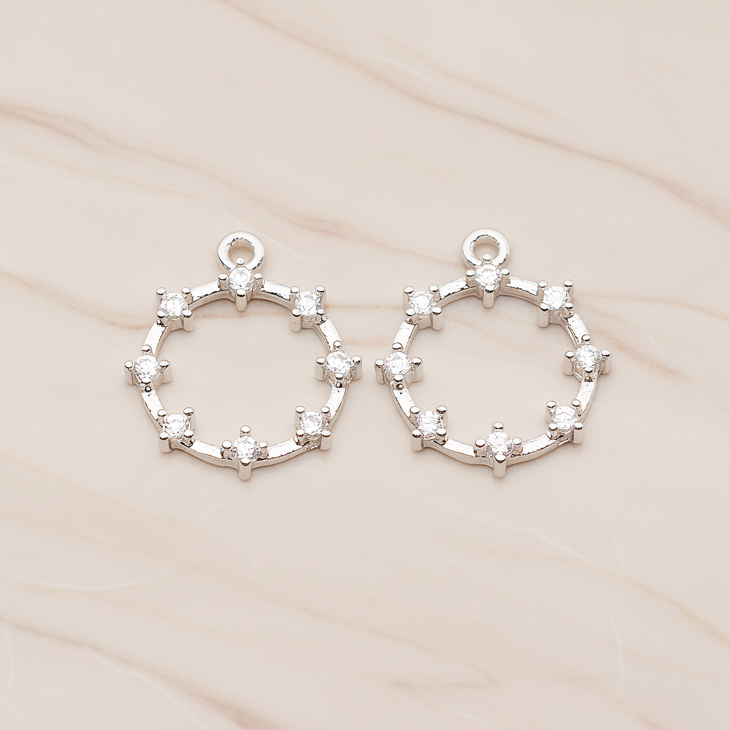 Crown of Beauty Round Cubic Pendant, 2 Pc on warm marble background (PD.1840)