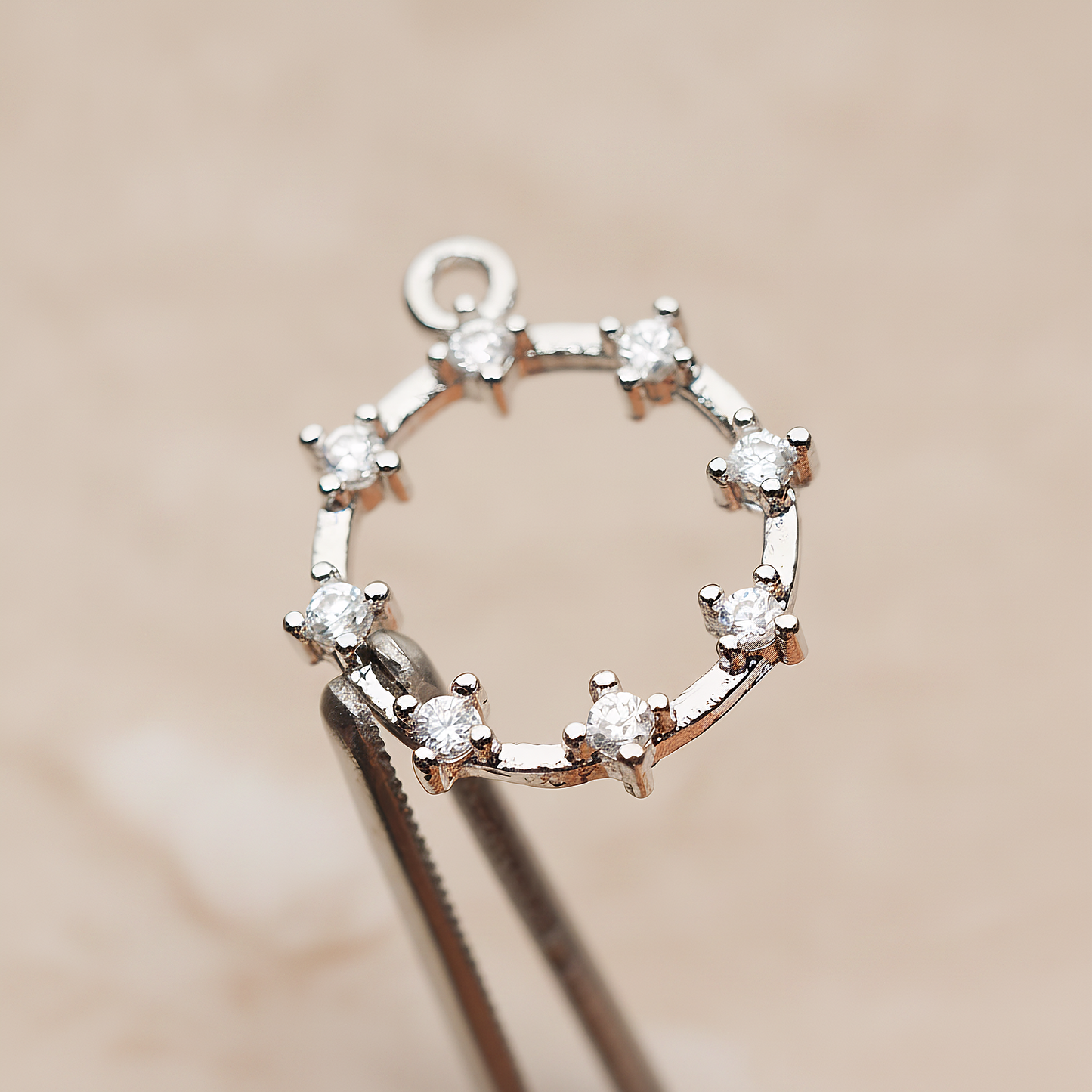 Crown of Beauty Round Cubic Pendant, 2 Pc on warm marble background (PD.1840)