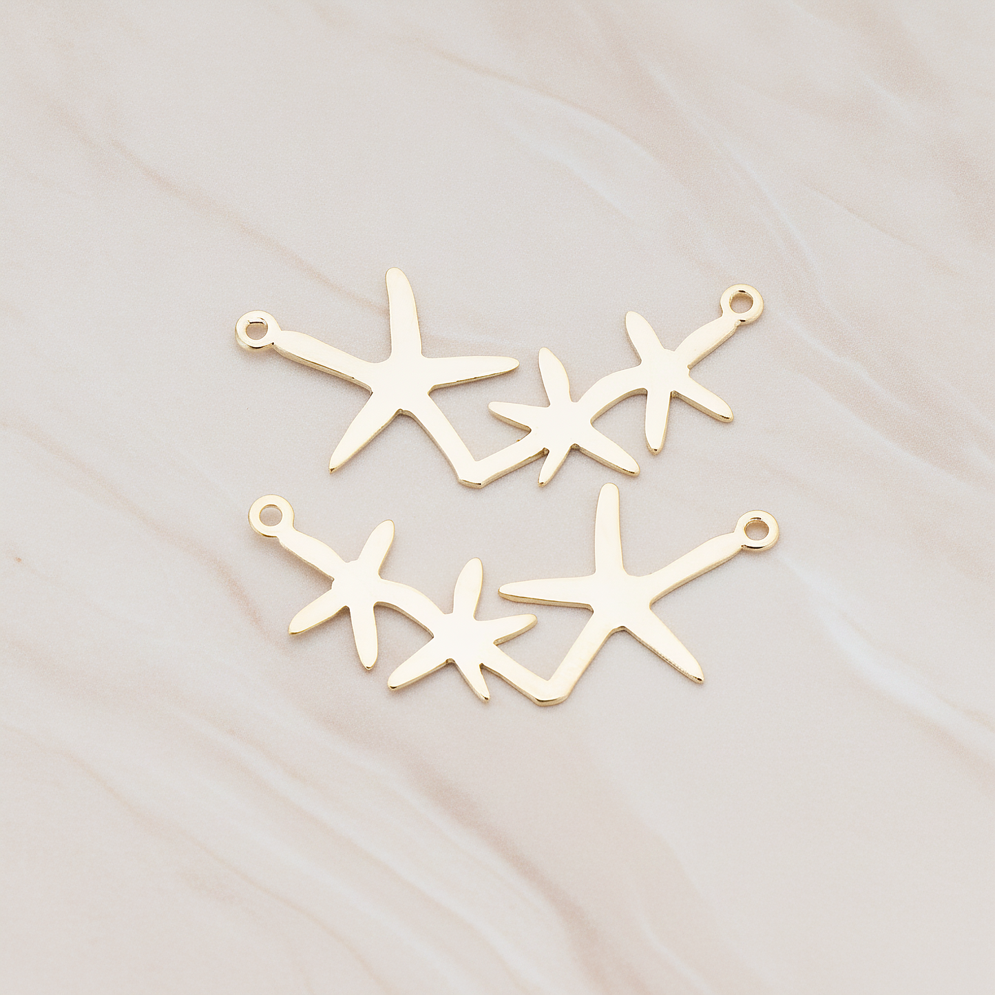 Triple Starfish Linked Pendant, 2 Pc on warm marble background (PD.189)