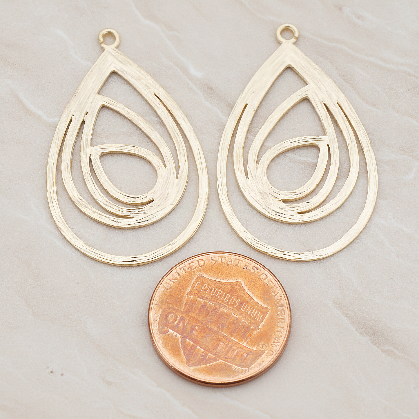 Multiple Teardrop Pendant, 2 Pc on warm marble background (PD.190)