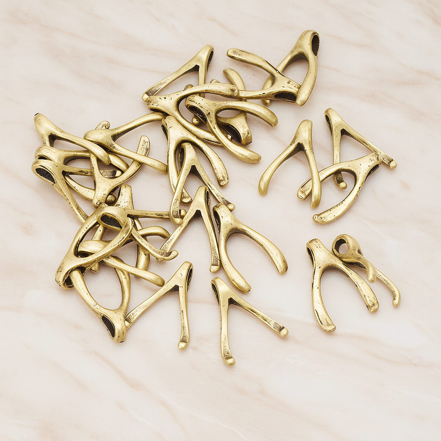 SMALL Wishbone Pendant, 2 Pc on warm marble background (PD.205-01)