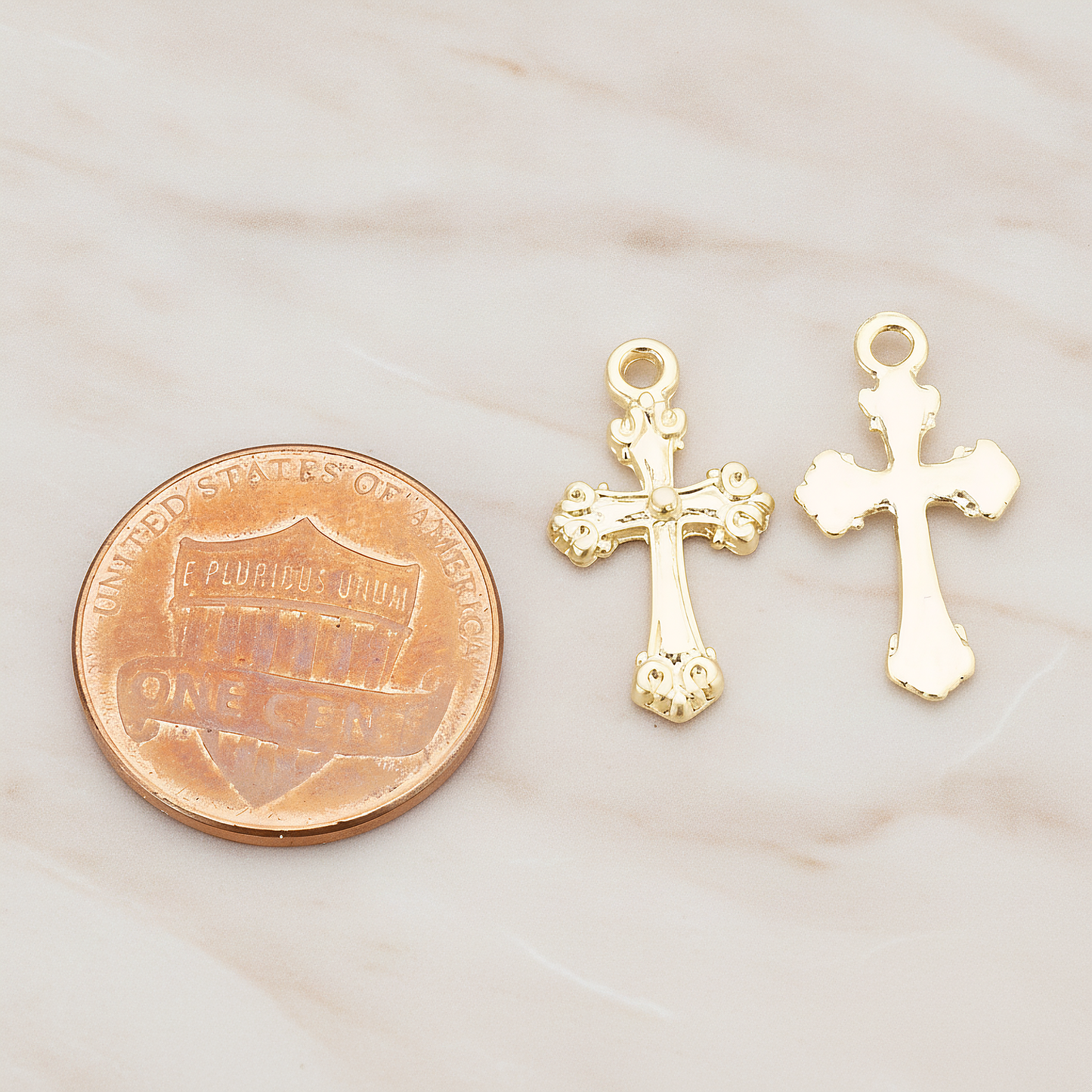 Small Cathedral Cross Pendant, 4 Pc on warm marble background (PD.227)