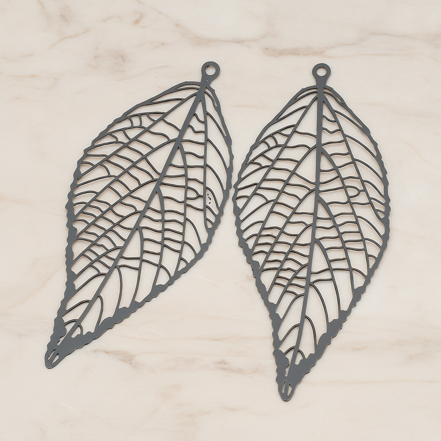 Pressed Filigree Vein Leaf Pendant,, 2 Pc on warm marble background (PD.243)