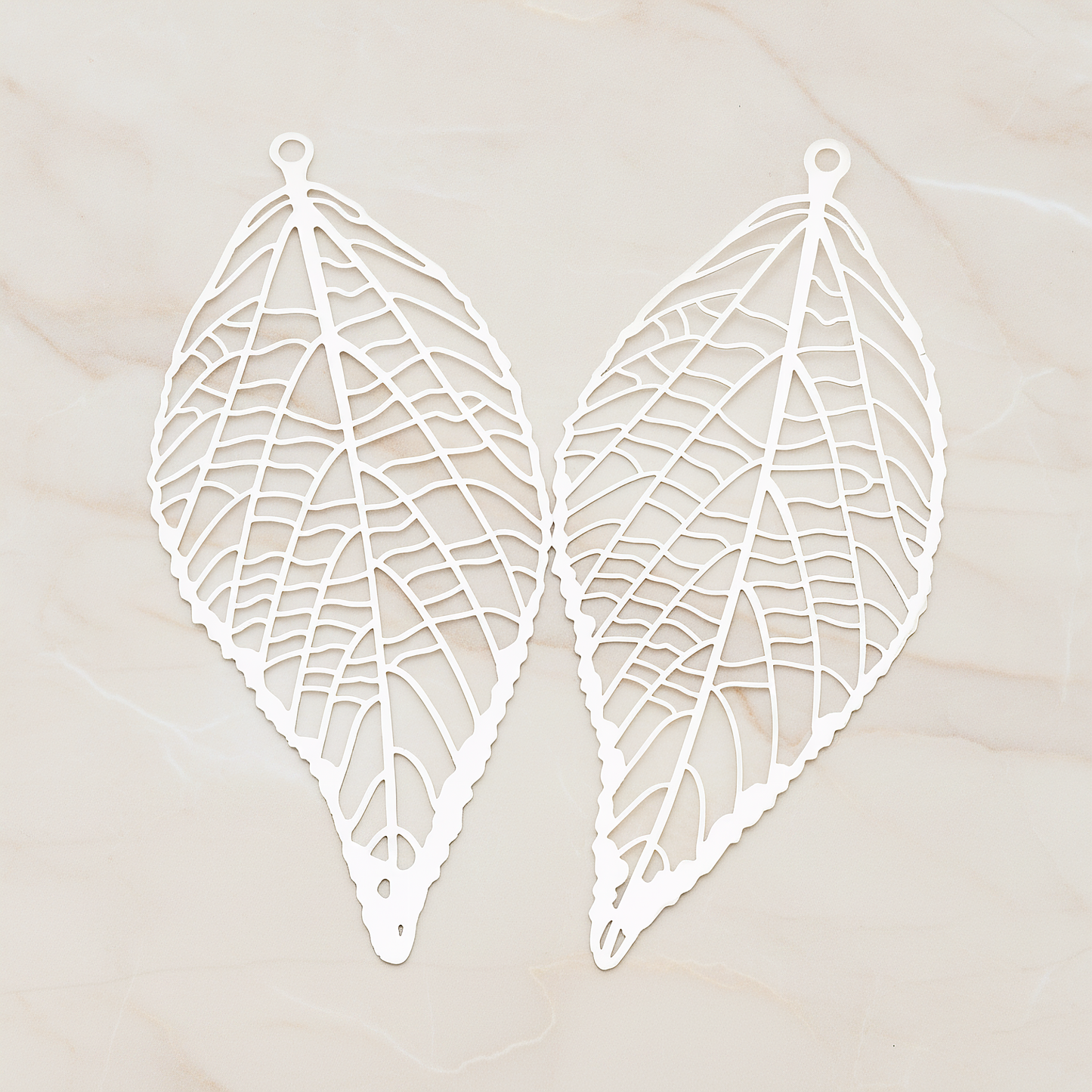 Pressed Filigree Vein Leaf Pendant,, 2 Pc on warm marble background (PD.243)