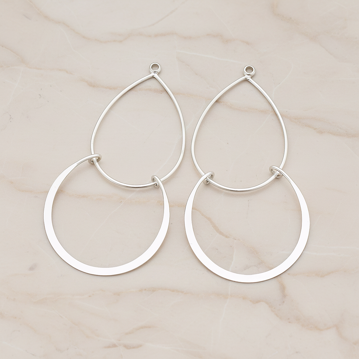 Double Teardrop Linked Pendant, 2 Pc on warm marble background (PD.288)