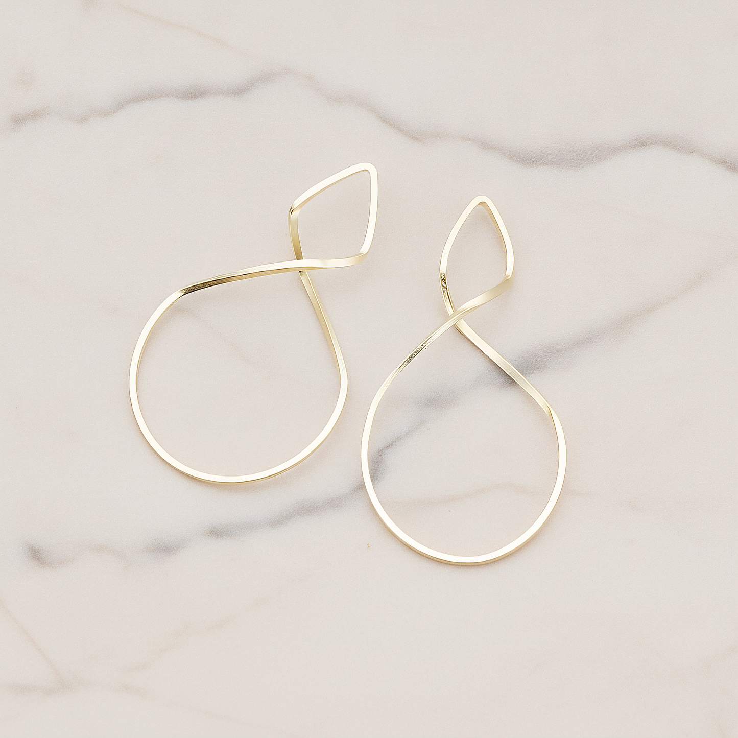 Simple Twisted Teardrop Pendant, 2 Pc on warm marble background (PD.322)