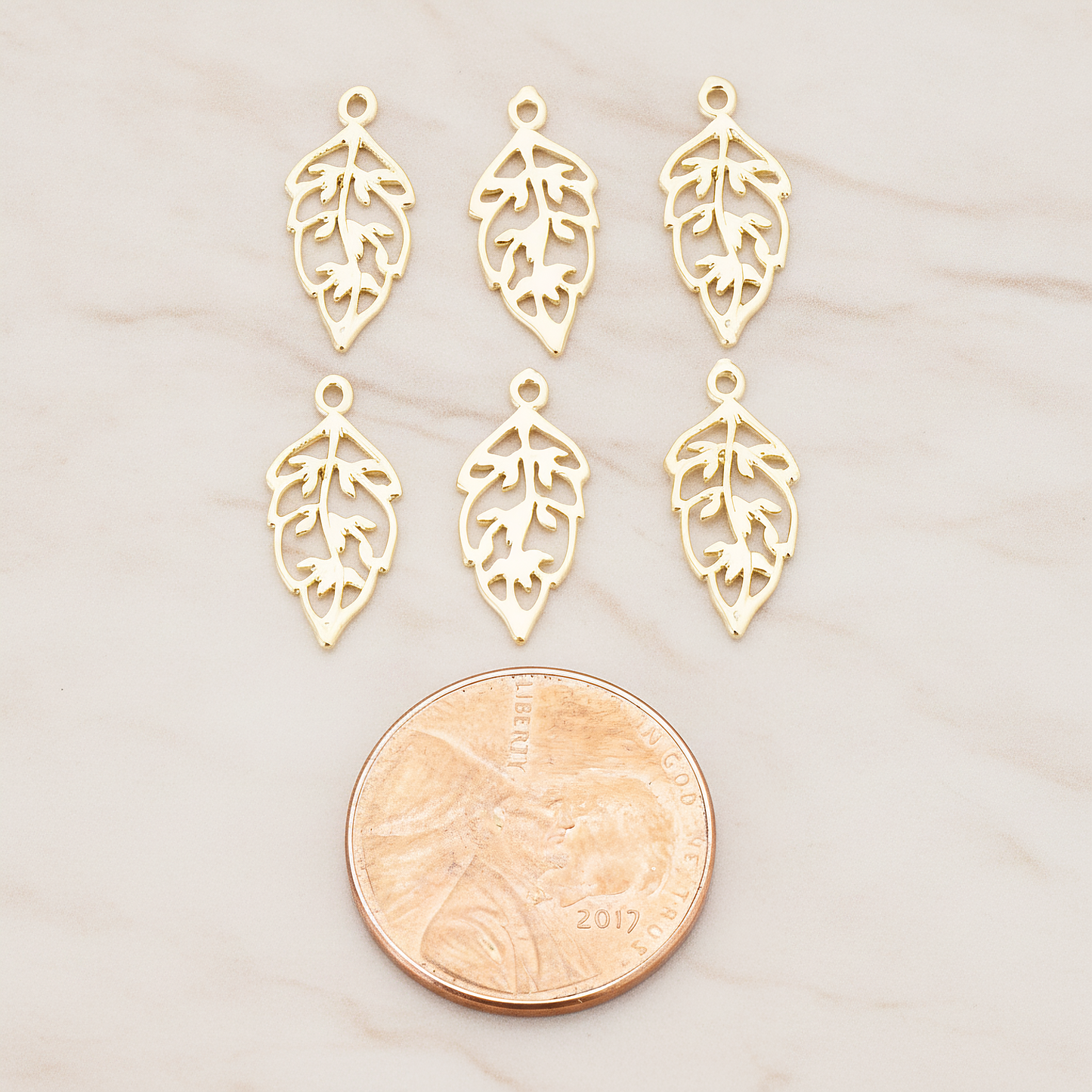 Unique Leaf Pendant, 4 Pc on warm marble background (PD.549)