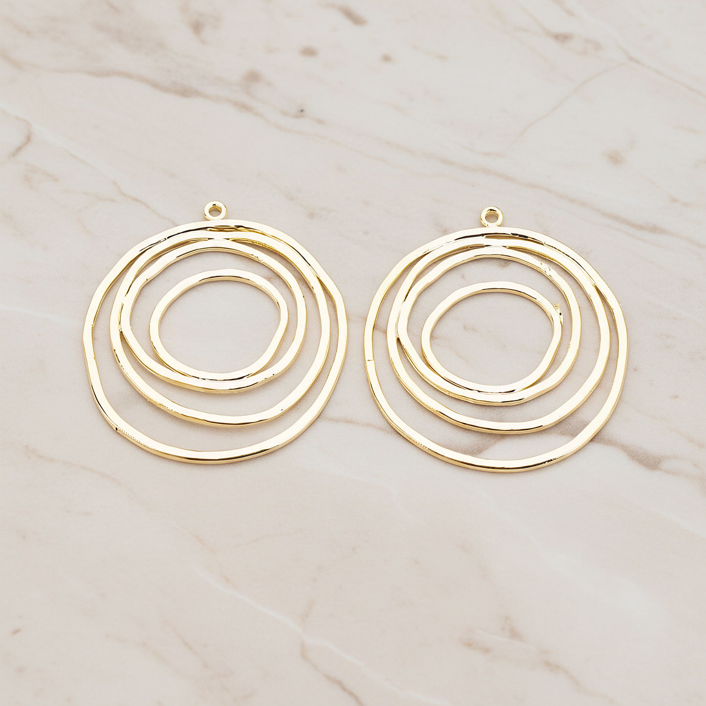 Round Circle Swirl Pendant, 2 Pc on warm marble background (PD.556)