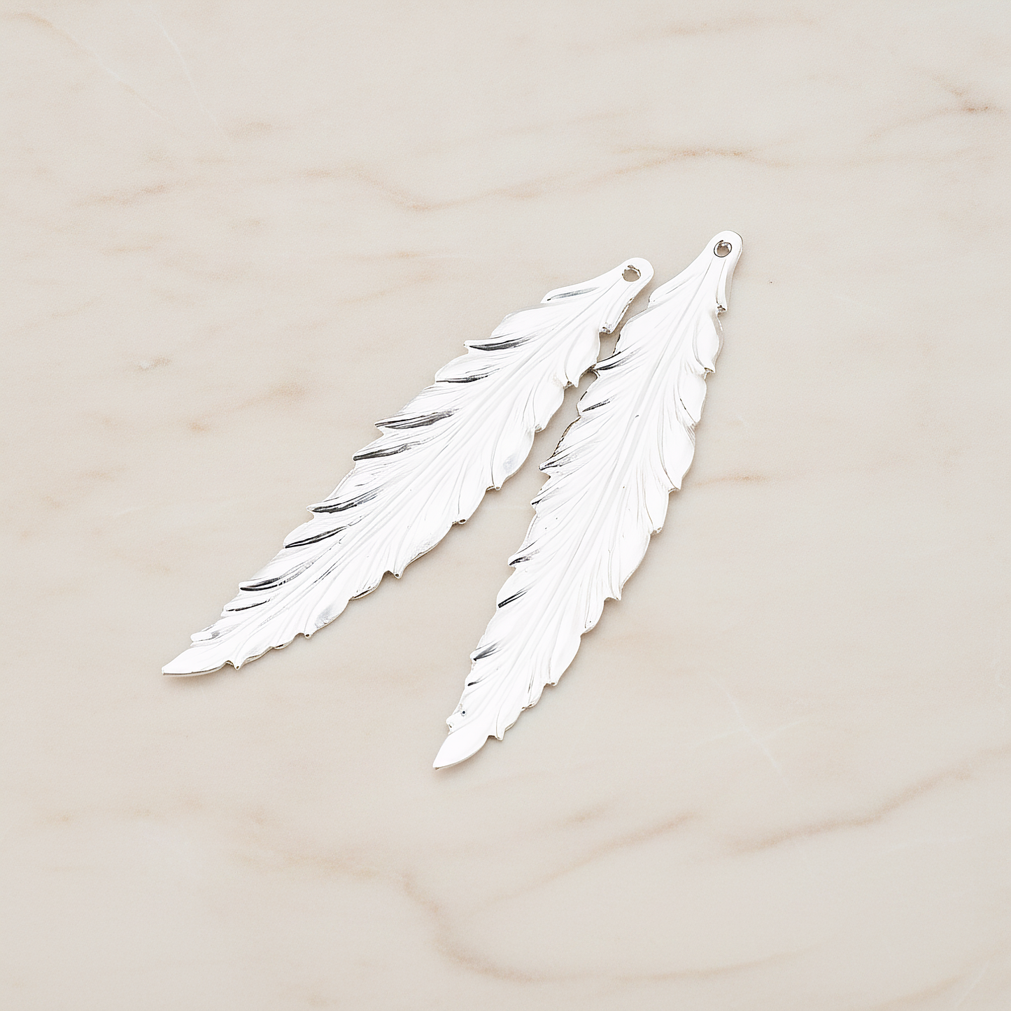 Thin Long Leaf Pendant, 2 Pc on warm marble background (PD.575-02)