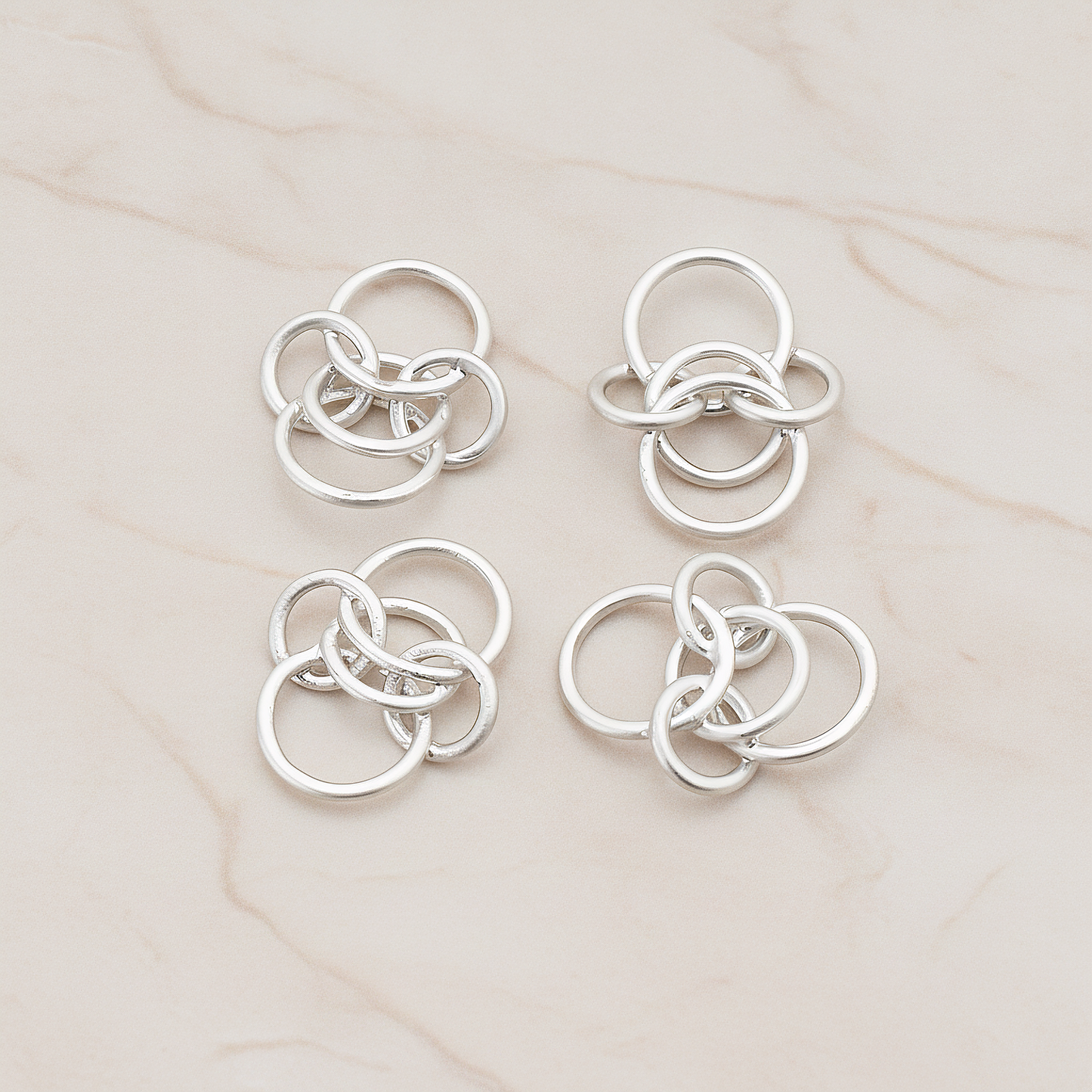 Multi Small Links Linked Pendant, 2 Pc on warm marble background (PD.765)