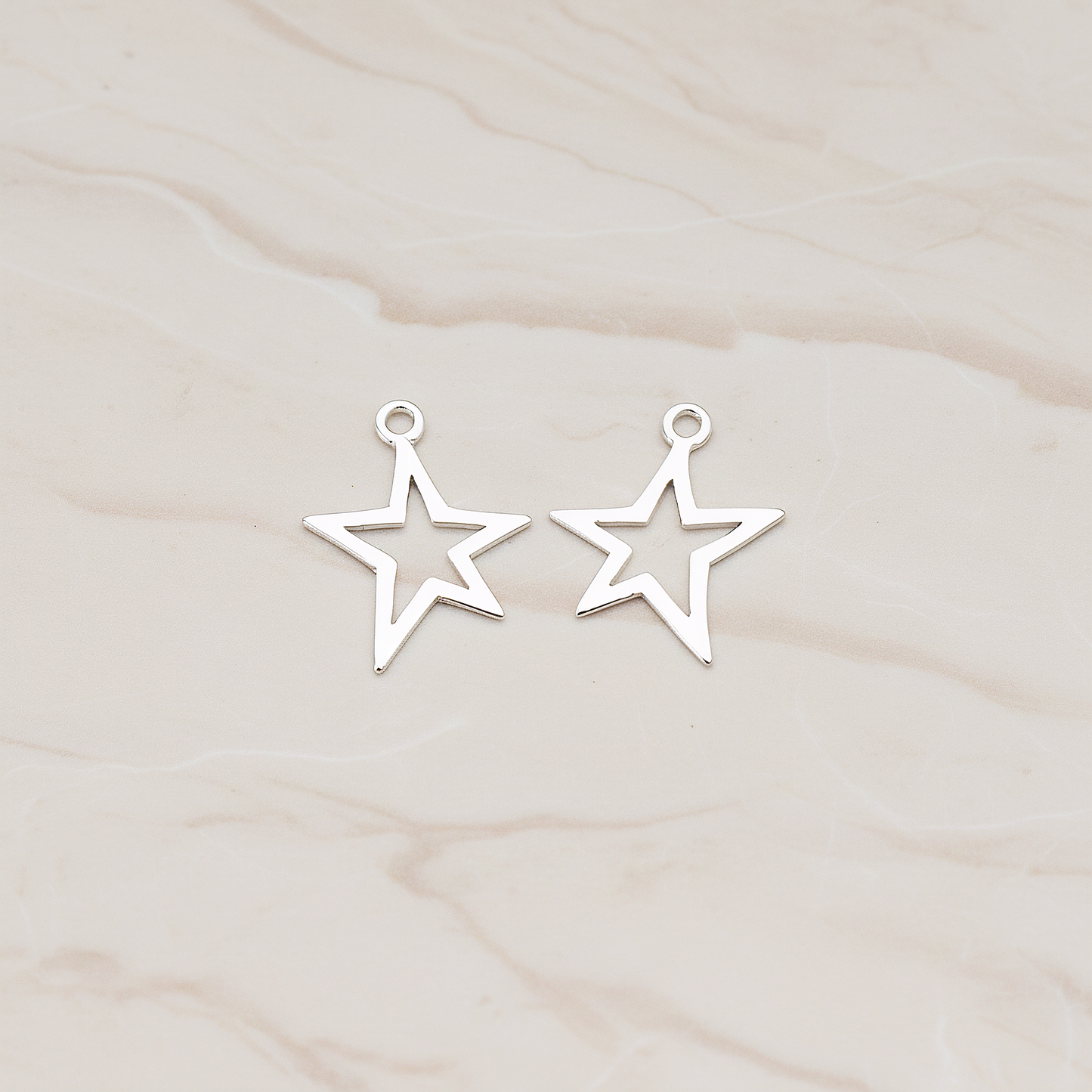 Funky Star Pendant, 2 Pc on warm marble background (PD.876)