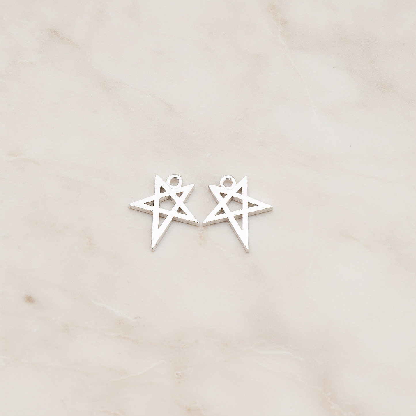 Drawing Star Pendant, 2 Pc on warm marble background (PD.889)