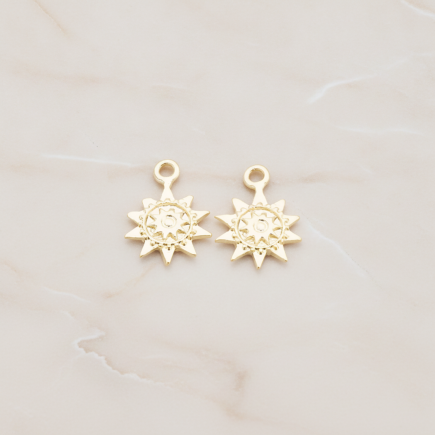 Double Sun Charm Pendant, 2 Pc on warm marble background (PD.906)
