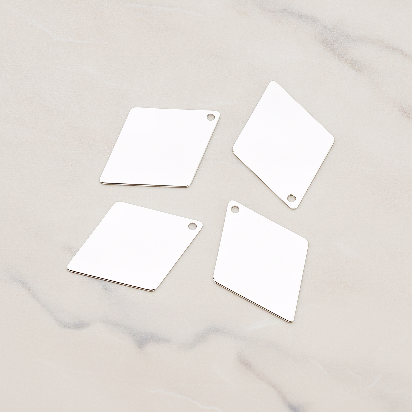 Small Diamond Shaped Pendant, 2 Pc on warm marble background (PD.924-01)