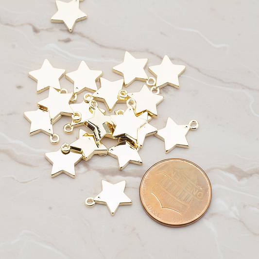 Mini Star Pendant, 2 Pc on warm marble background (PD.925)