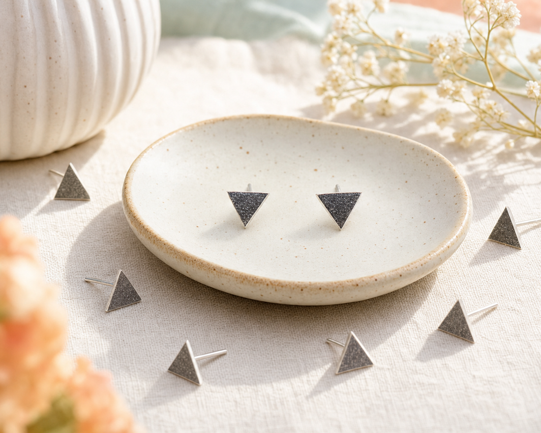 Satin brushed gold-tone mini triangle stud ear posts for jewelry making, shown as a matching pair with the straight post visible