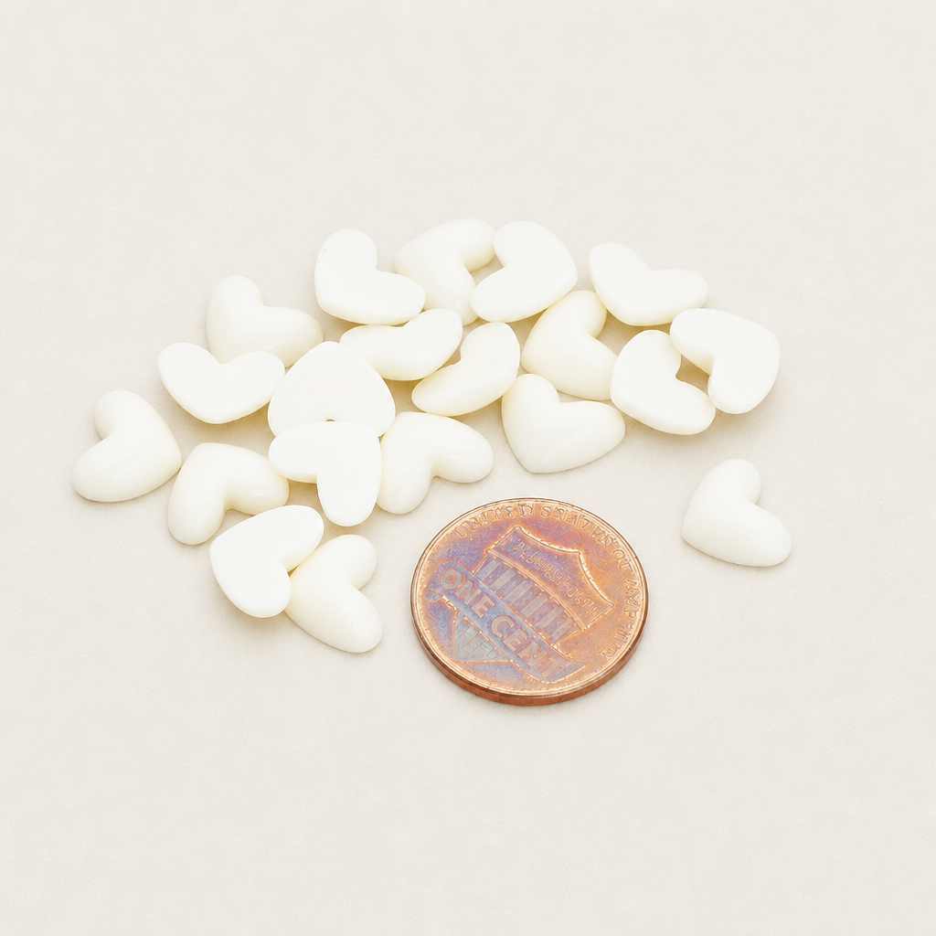 Tiny heart flat back cabochons in various colors
